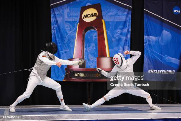 Mohamed Hamza of Princeton and Jan Jurkiewicz of St. John's compete in the Mens Foil finals bout during the Division I Mens and Womens Fencing...