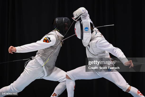 Mohamed Hamza of Princeton and Jan Jurkiewicz of St. John's compete in the Mens Foil finals bout during the Division I Mens and Womens Fencing...