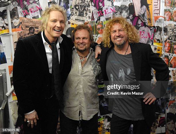 Matt Sorum of Velvet Revolver, presenter, with Michael Anthony and Sammy Hagar of Van Halen, inductees *EXCLUSIVE*