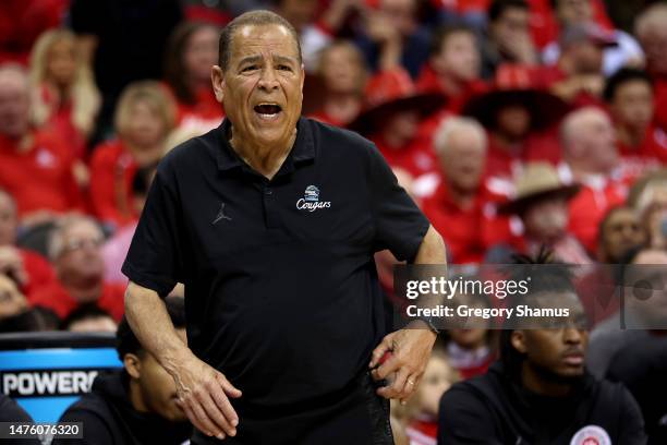 Head coach Kelvin Sampson of the Houston Cougars reacts to a play against the Miami Hurricanes during the second half in the Sweet 16 round of the...