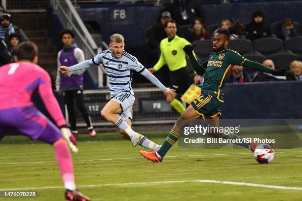 Marinos Tzionis of Sporting Kansas City crosses the ball during a game between Los Angeles Galaxy and Sporting Kansas City at Children's Mercy Park...