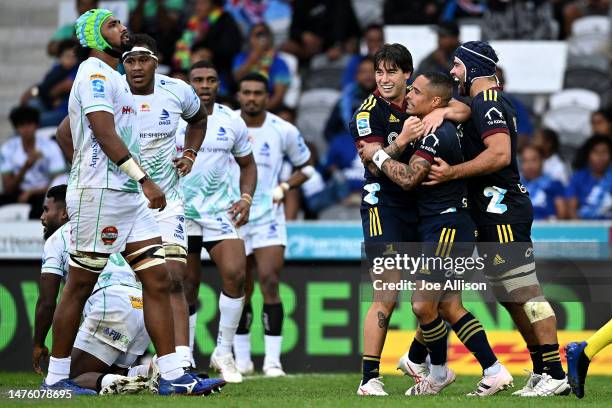 Aaron Smith of the Highlanders celebrates after scoring a try during the round five Super Rugby Pacific match between Highlanders and Fijian Drua at...