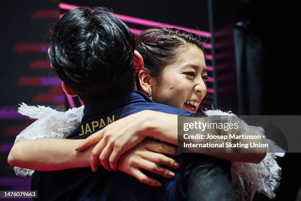 Kana Muramoto and Daisuke Takahashi of Japan react after the Ice Dance Free Dance during the ISU World Figure Skating Championships at Saitama Super...