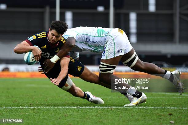 Martin Bogado of the Highlanders scores a try during the round five Super Rugby Pacific match between Highlanders and Fijian Drua at Forsyth Barr...