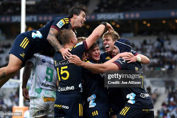 Cameron Millar of the Highlanders celebrates after scoring a try during the round five Super Rugby Pacific match between Highlanders and Fijian Drua...