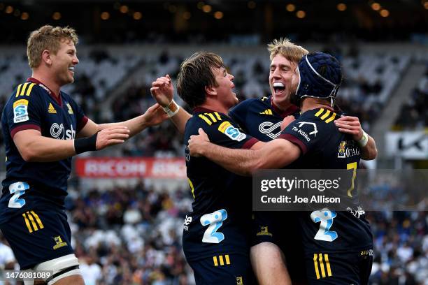 Cameron Millar of the Highlanders celebrates after scoring a try during the round five Super Rugby Pacific match between Highlanders and Fijian Drua...