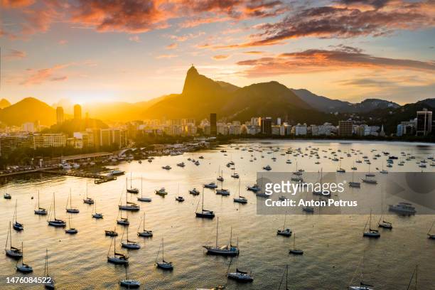rio de janeiro at sunset, brazil. yachts at sunset - rio de janeiro aerial stock pictures, royalty-free photos & images