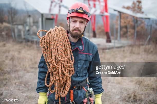 a worker prepares to repair a repeater - repeater stock pictures, royalty-free photos & images