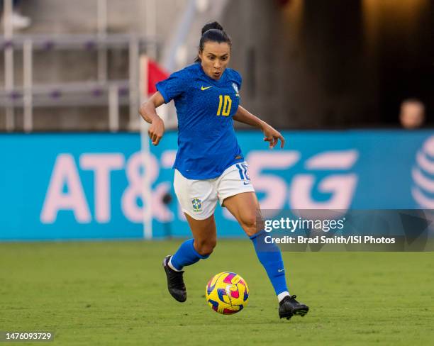 Marta of Brazil dribbles during a game between Brazil and Japan at Exploria Stadium on February 16, 2023 in Orlando, Florida.