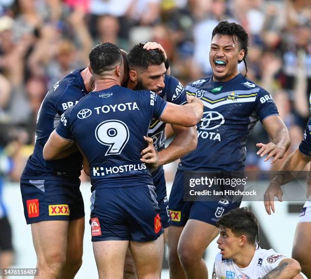 James Tamou of the Cowboys celebrates after scoring a try during the round four NRL match between North Queensland Cowboys and Gold Coast Titans at...