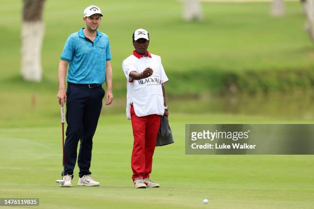 Ashley Chesters of England putts on the 15th hole hole on Day Two of the Duncan Taylor Black Bull Challenge 2023 at Karnataka Golf Association on...