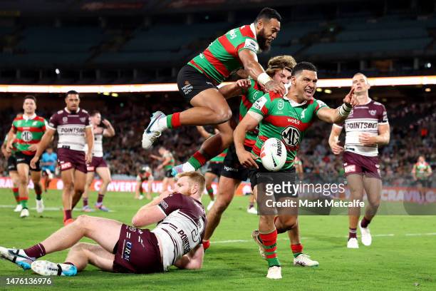 Cody Walker of the Rabbitohs celebrates scoring a try wth team mates during the round four NRL match between South Sydney Rabbitohs and Manly Sea...