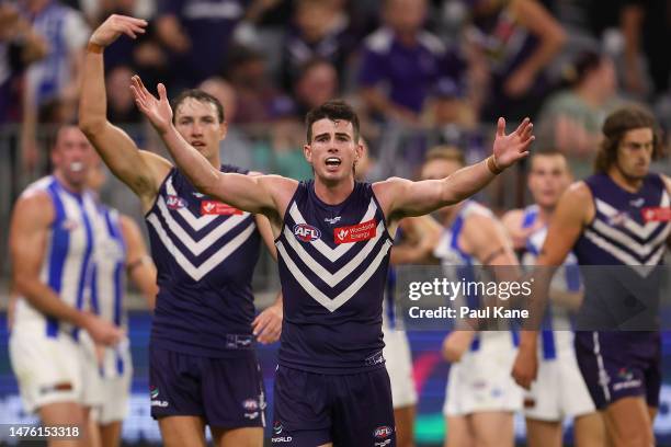 Brennan Cox and Andrew Brayshaw of the Dockers question the umpires after the siren during the round 2 AFL match between the Fremantle Dockers and...