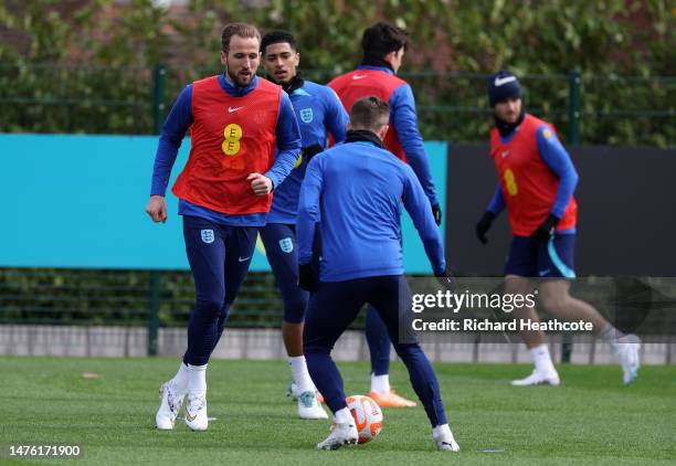 Harry Kane of England warms up during England Training Session & Press Conference at Tottenham Hotspur Training Centre on March 25, 2023 in Enfield,...