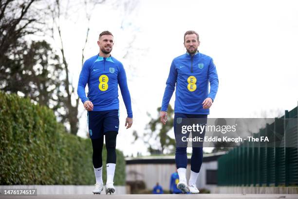 Jordan Henderson and Harry Kane of England interact during England Training Session & Press Conference at Tottenham Hotspur Training Centre on March...