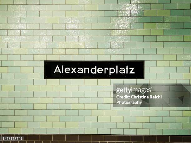 underground sign saying "alexanderplatz" - berlin subway stock pictures, royalty-free photos & images