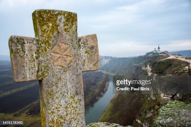 a view of the old cross at rock monastery orheiul vechi,old orhei,  trebujeni, moldova - moldavia stock pictures, royalty-free photos & images