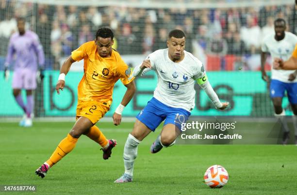 Kylian Mbappe of France, Jurrien Timber of Netherlands during the UEFA EURO 2024 qualifying round group B match between France and Netherlands at...