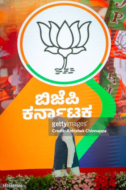 India's Prime Minister Narendra Modi walks to address a gathering of supporters during a political event organised by the Bharatiya Janata Party at...