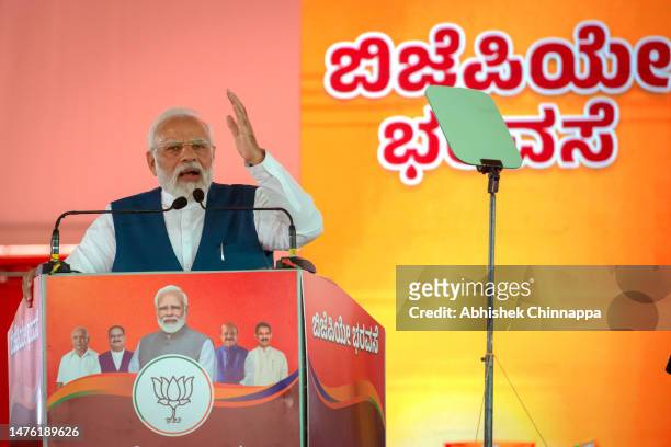 India's Prime Minister Narendra Modi addresses a gathering of supporters during a political event organised by the Bharatiya Janata Party at the GMIT...