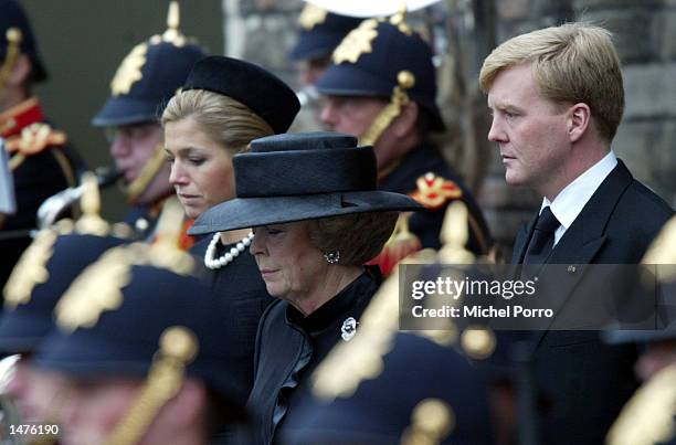 Dutch Queen Beatrix , Crown Prince Willem Alexander and Princess Maxima leave the Nieuwe Kerk church after the funeral ceremony for Prince Claus...