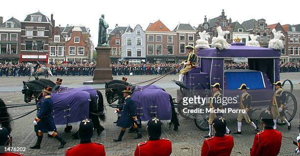 The hearse carrying the coffin of Prince Claus of the Netherlands is drawn towards the Nieuwe Kerk church on its way to the funeral ceremony October...