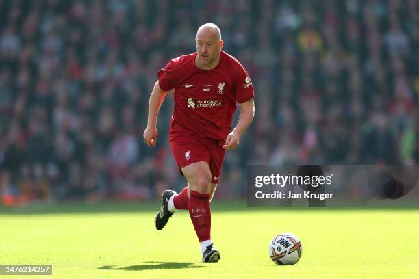 Charlie Adam of Liverpool controls the ball during the Legends match between Liverpool and Celtic at Anfield on March 25, 2023 in Liverpool, England.