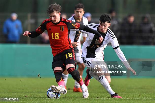 Nicolas Oliveira Kisilowski of Germany competes for the ball with Mika Godts of Belgium during the UEFA European Under-19 Championship Malta 2023...