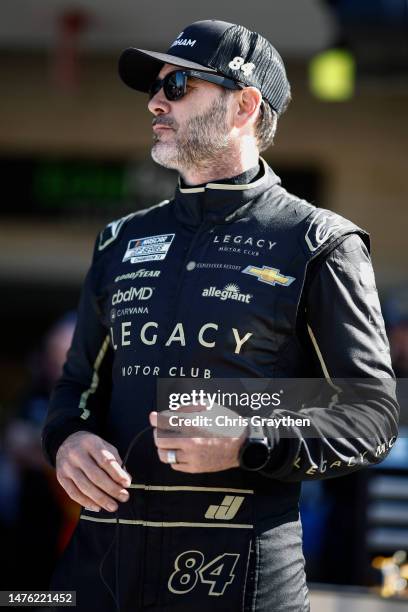 Jimmie Johnson, driver of the Club Wyndham Chevrolet, waits in the garage area during qualifying for the NASCAR Cup Series EchoPark Automotive Grand...