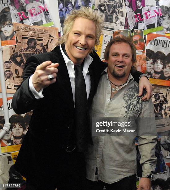 Matt Sorum of Velvet Revolver, presenter, with Michael Anthony of Van Halen, inductee *EXCLUSIVE*