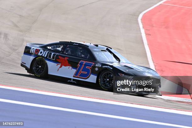 Jenson Button, driver of the Mobil 1 Ford, drives during qualifying for the NASCAR Cup Series EchoPark Automotive Grand Prix at Circuit of The...