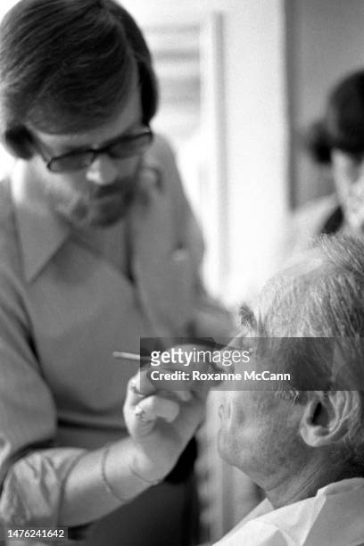 Award-winning actor Henry Fonda has makeup applied by makeup artist Graham Meech-Burkestone before being filmed for a Boy Scouts of America televsion...