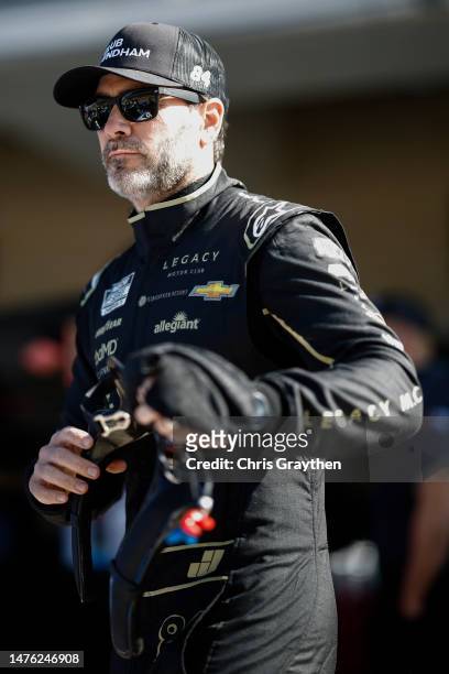 Jimmie Johnson, driver of the Club Wyndham Chevrolet, waits in the garage area during qualifying for the NASCAR Cup Series EchoPark Automotive Grand...