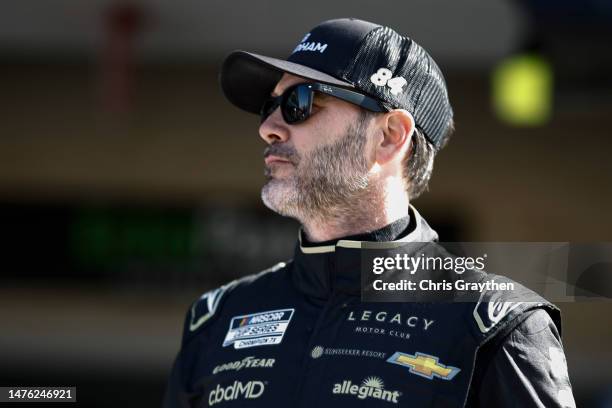 Jimmie Johnson, driver of the Club Wyndham Chevrolet, waits in the garage area during qualifying for the NASCAR Cup Series EchoPark Automotive Grand...