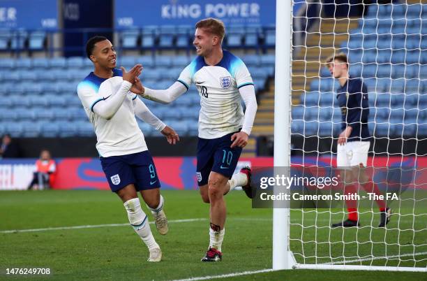 Emile Smith Rowe of England U21 celebrates their sides first goal with team mate Cameron Archer during the International Friendly match between...