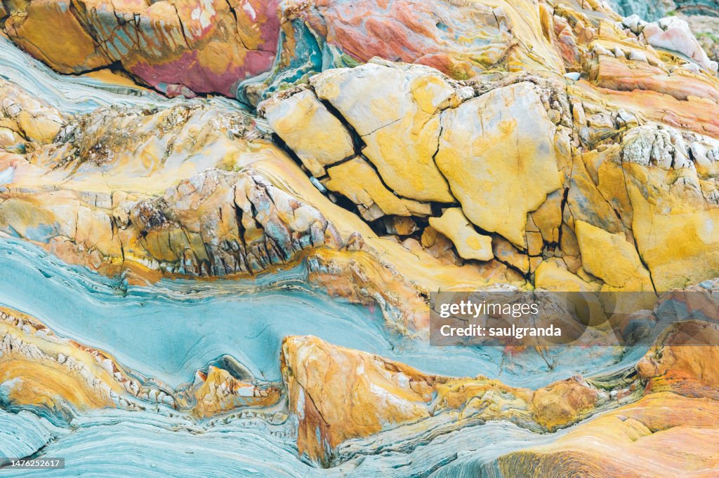 Rock natural pattern, gray slates, white quartzite and sandstone