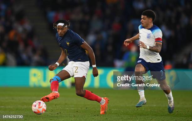 Mohamed Simakan of France U21 battles for possession with Morgan Gibbs-White of England U21 during the International Friendly match between England...
