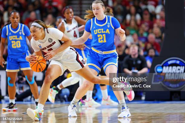 Victaria Saxton of the South Carolina Gamecocks saves a loose ball against Lina Sontag of the UCLA Bruins during the first half in the Sweet 16 round...