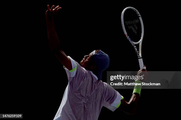 Christopher Eubanks serves to Borna Coric of Croatia during the Miami Open at Hard Rock Stadium on March 25, 2023 in Miami Gardens, Florida.