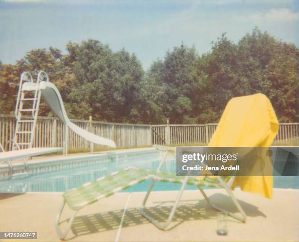 vintage swimming pool, vintage pool with outdoor lounge chair, relaxing summer vacation poolside in backyard - vintage crockery stock pictures, royalty-free photos & images