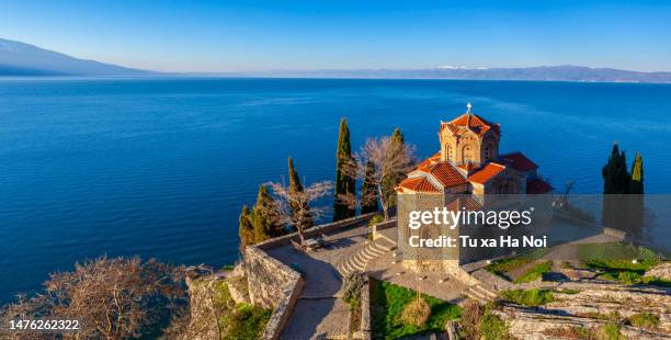 church of st. john at kaneo after sunrise - macedonië land stockfoto's en -beelden