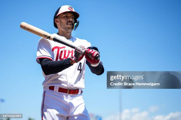 Carlos Correa of the Minnesota Twins looks on during a spring training game against the Atlanta Braves on March 25, 2023 at Hammond Stadium in Fort...