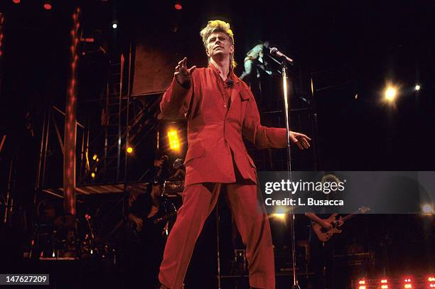 English musician David Bowie performs in concert, New York, New York, circa 1987.