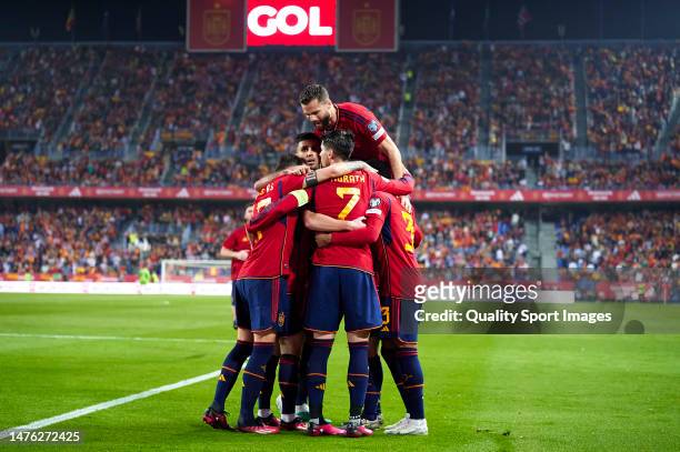 Dani Olmo of Spain celebrates after scoring their side's first goal with his teammates during the UEFA EURO 2024 Qualifying Round Group A match...