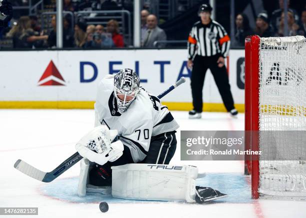 Joonas Korpisalo of the Los Angeles Kings makes a save against the Winnipeg Jets in the first period at Crypto.com Arena on March 25, 2023 in Los...