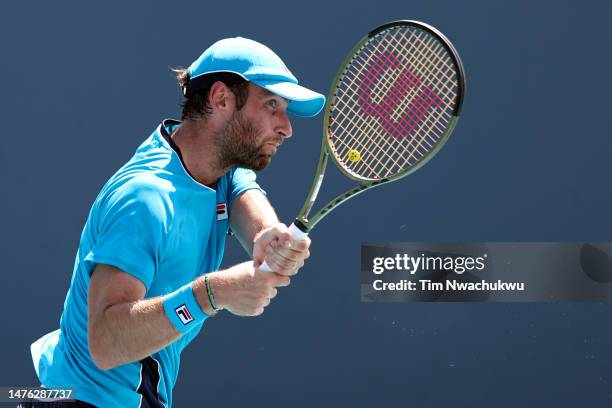 Quentin Halys of France returns a serve to Alex de Minaur of Australia during the Miami Open held at Hard Rock Stadium on March 25, 2023 in Miami...