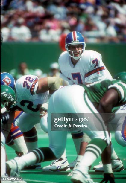 Quarterback John Elway calls a play in the game between the Denver Broncos vs the New York Jets on September 5, 1993 at The Meadowlands in East...