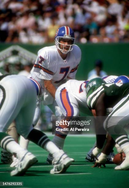 Quarterback John Elway calls a play in the game between the Denver Broncos vs the New York Jets on September 5, 1993 at The Meadowlands in East...