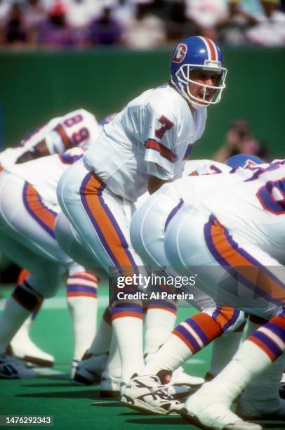 Quarterback John Elway calls a play in the game between the Denver Broncos vs the New York Jets on September 5, 1993 at The Meadowlands in East...