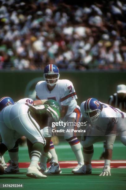 Quarterback John Elway calls a play in the game between the Denver Broncos vs the New York Jets on September 5, 1993 at The Meadowlands in East...